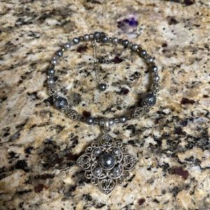 Silver beaded necklace with gray pearls